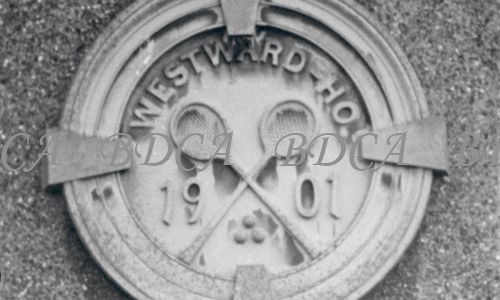 58  127  tennis club sign above door