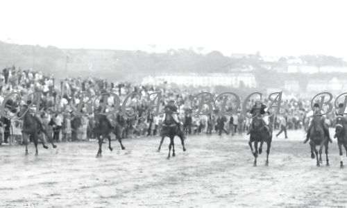 58   horse racing on beach