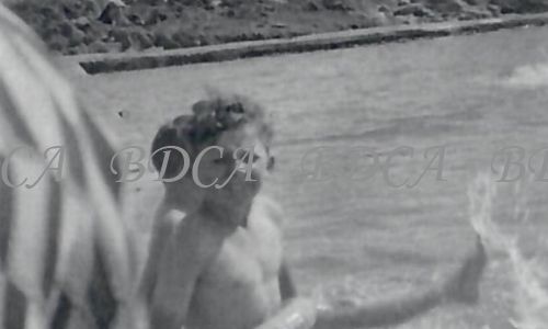 58 .6  child in rock pool