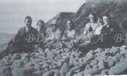 58   people on pebbles sand dunes